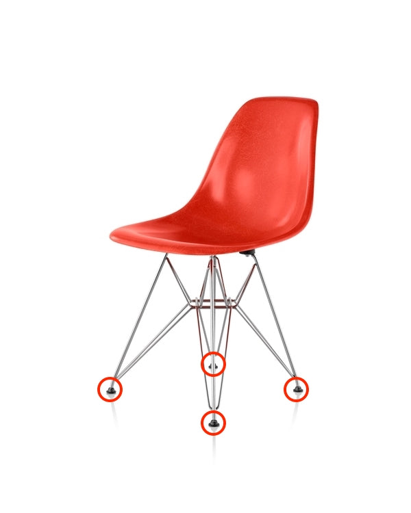 Red Eames side chair with wire base and ball-style replacement feet glides