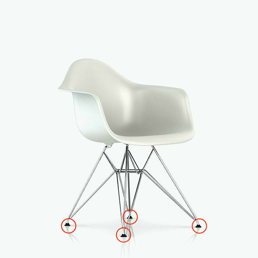 Eames or Virta Eiffel Tower replacement feet installed on a white DSR side chair, showcasing the ball-style feet glides