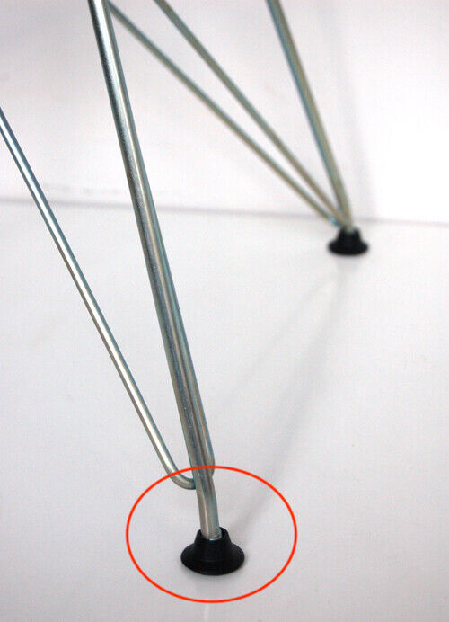 Close-up view of the wire base with ball-style replacement feet glides for Eames chairs