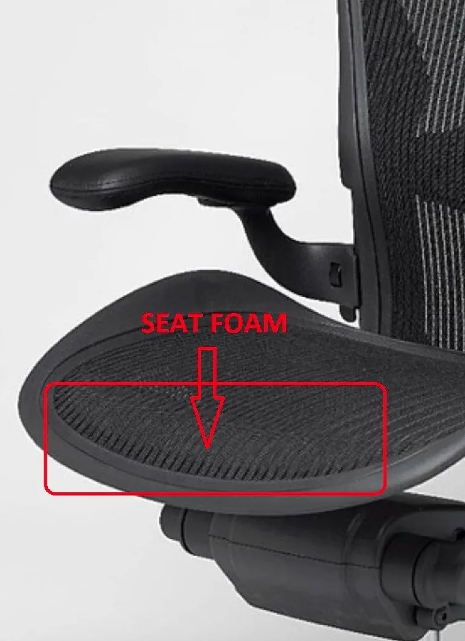 Location of Herman Miller Aeron seat foam under the chair for replacement and comfort enhancement.